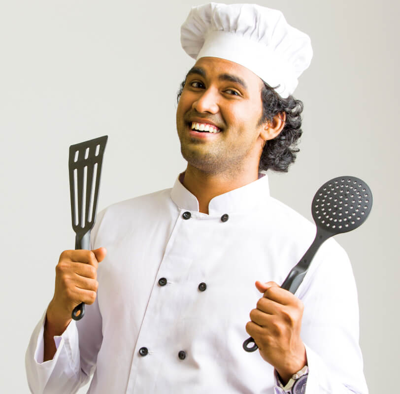 A chef plating an experimental basmati dish